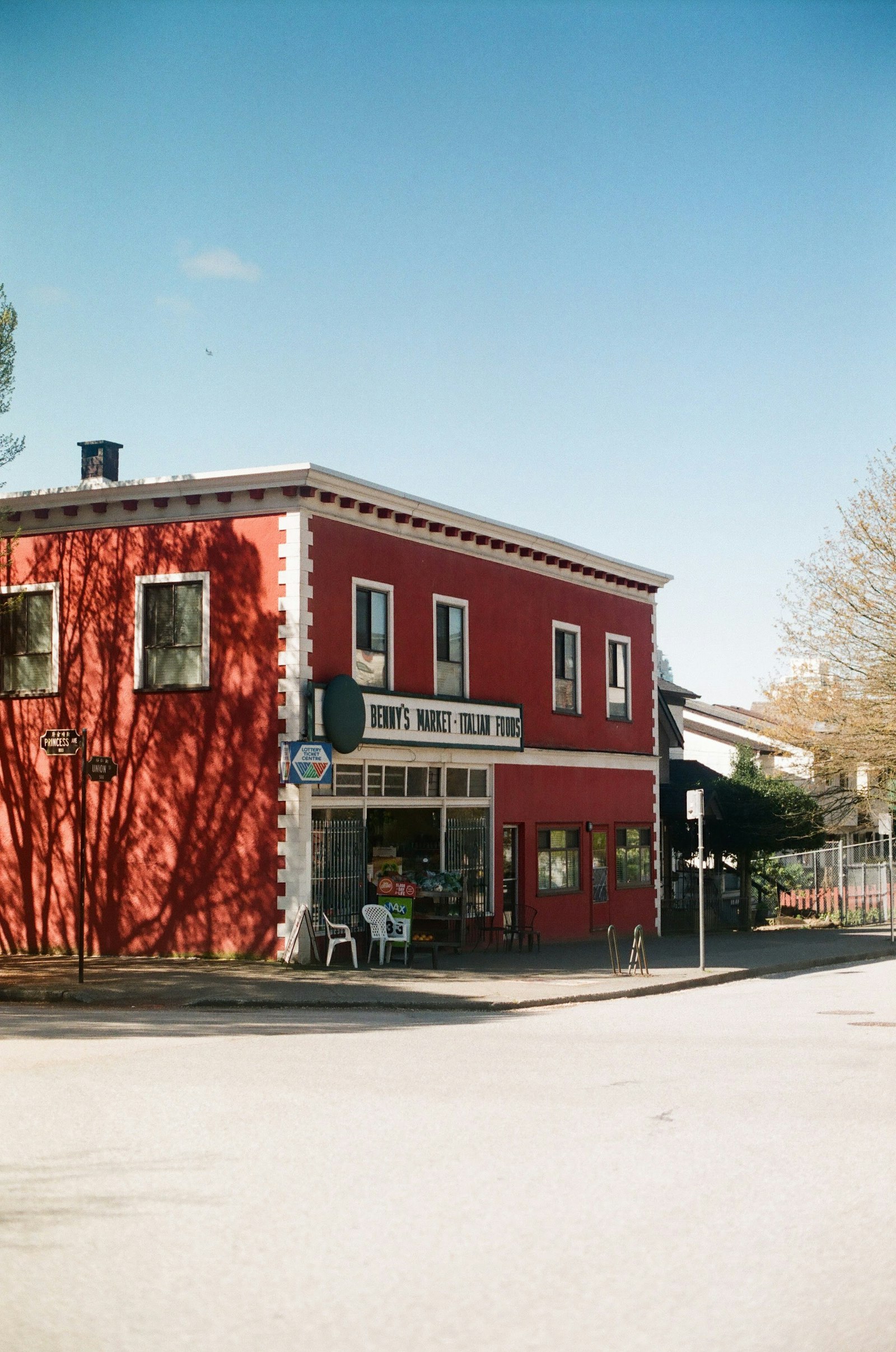 A red-brick corner market storefront